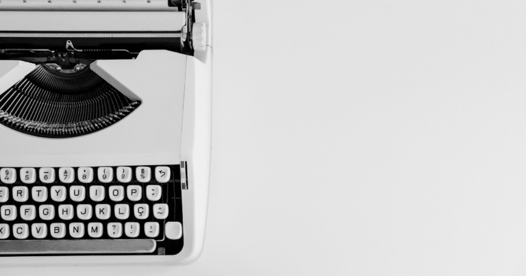 typewriter on white background representing doula website copy