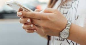 woman searching on cell phone