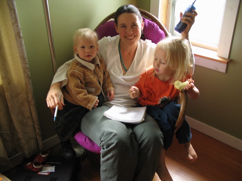 doula & mom with two young children in lap
